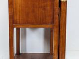 an old wooden table with a drawer on top of it