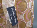 an image of a close up of a dress with a label on it
