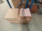 a box that is sitting on a pallet in a warehouse