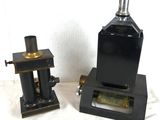 two different types of machines sitting on a table