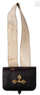 an image of a black purse with a gold leaf on it