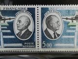 two stamps with a picture of two men and a plane on them