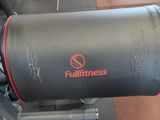 a close up of a gym equipment with a red logo on it