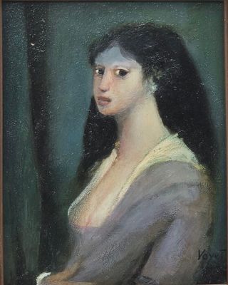 portrait of a woman in a gray dress by a window
