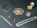 a lot of silver items that are on a table