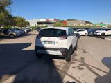 the car is parked in the parking lot next to other cars