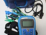 a blue bag and a blue and black bag on a table