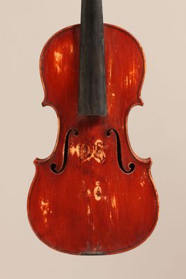 a close up of a violin with a bow on a white background