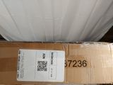 boxes are stacked on top of each other in a room