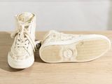 a pair of shoes that are on a table