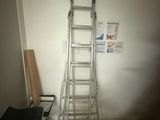 a ladder leaning against a wall in a room
