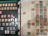 a binder with a lot of stamps on it
