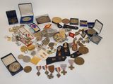 many medals and medals that are on the table