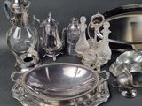 a lot of silver items that are on a table