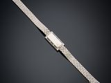 a diamond - set watch bracelet, by cartier