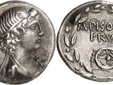 a silver coin with an image of a woman on it