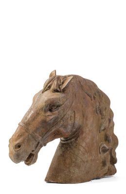 a statue of a horse head on a white background