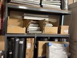 a room with a lot of boxes and boxes on the shelves