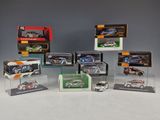 many different models of cars in a display case