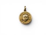 une pièce d'or portant le portrait d'un homme