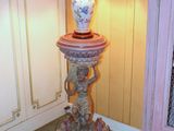 a lamp that is sitting on a table in a room