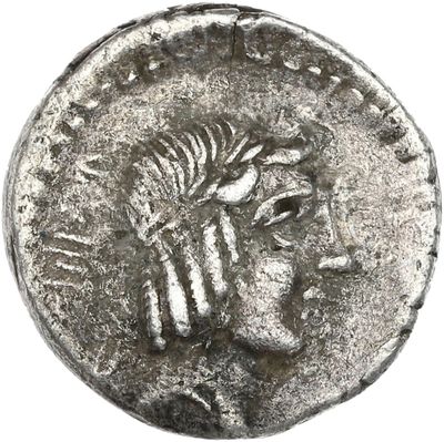 pièce de monnaie en argent portant l'image d'une tête d'homme