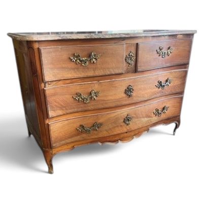 a wooden dresser with marble top on a white background