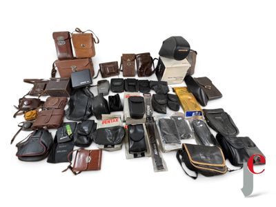 a lot of different types of leather items on the ground