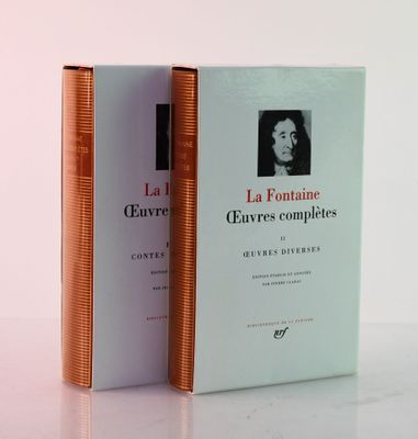 two books that are sitting next to each other on a table