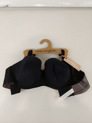 a black bra with a wooden hanger attached to it