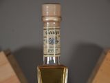 a bottle of liquor that is sitting on a table