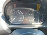 a close up of a car dashboard with a speedometer and gauges