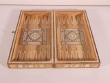 pair of wooden backgams inlaided with mother of pearl and mother of pearl inlays