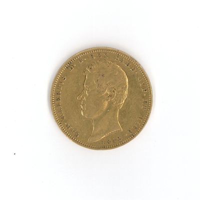 an old gold coin with a portrait of a man on it