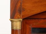 a close up view of a fireplace with a marble top