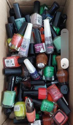 a box full of nail polish and manicures
