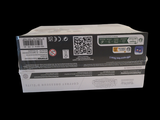 a box with a qr code on it on a black background