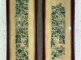 pair of framed chinese embroiderys of a man and a woman