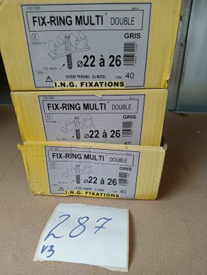 three boxes of fixing multis are stacked on top of each other