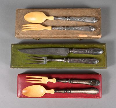 three forks and spoons in a box with a knife and fork