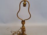 brass plated table lamp with a rope wrapped around the base