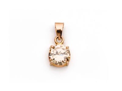 un pendentif en diamant monté sur or, sur fond blanc