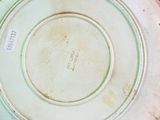 a plate with a label on it sitting on a table