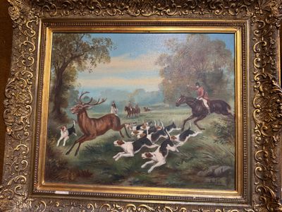 a picture of a painting of a hunting scene on the wall