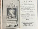 an open book with a picture of a woman on it
