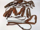 a lot of leather items that are on the table