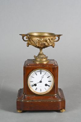 a clock that is sitting on top of a table