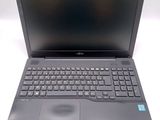 the laptop is open and ready to be used on the desk