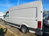 a white van that is parked in a parking lot