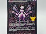 a close up of a pokemon card on a white surface